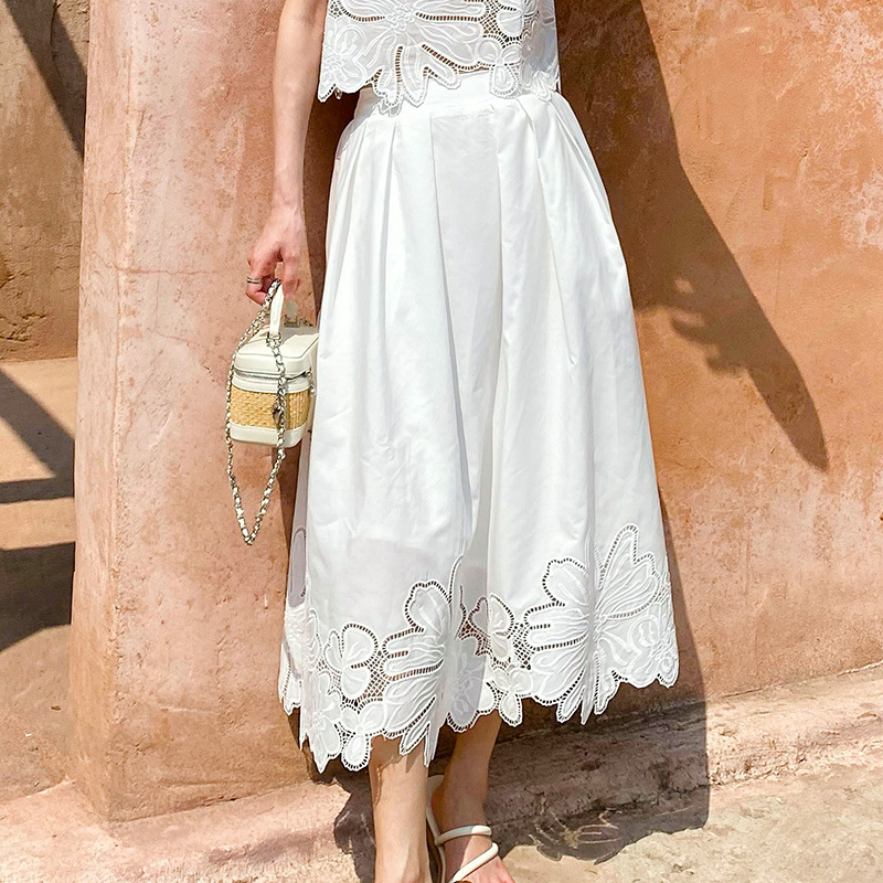 K White Ladies' Cut-Out Top With Embroidered Midi Skirt Set. No Necklaces Or Other Accessories_ecoleips.com