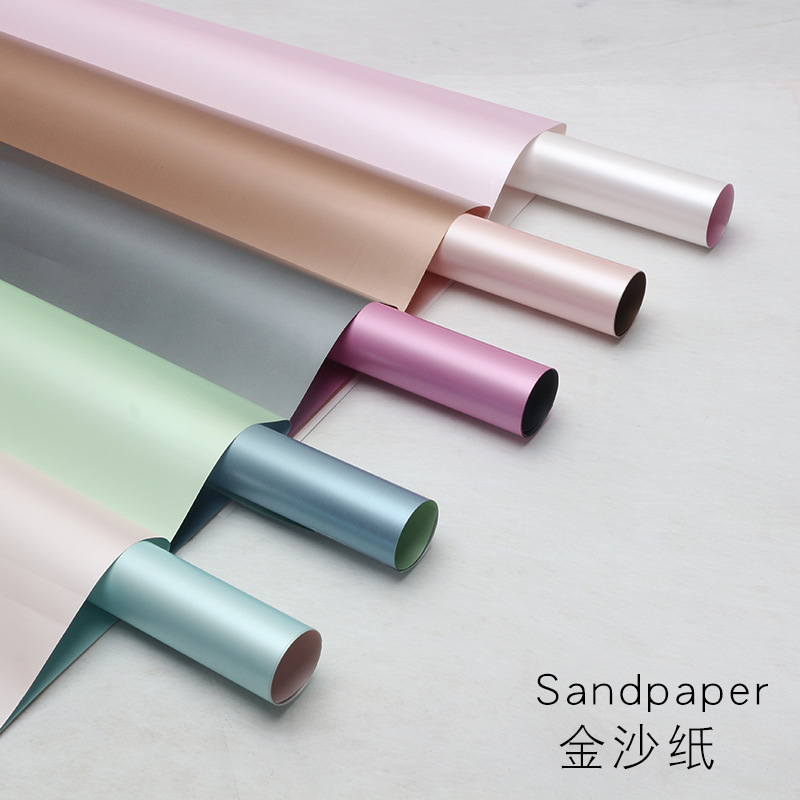 Huaxi papel de arena de oro flor papel de embalaje de papel mate de dos colores al por mayor ramo de regalo de papel de embalaje de materiales de viento fragante