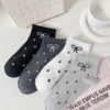 The new women's socks come in four colors and come with an extra pair at random [polka dot bow]