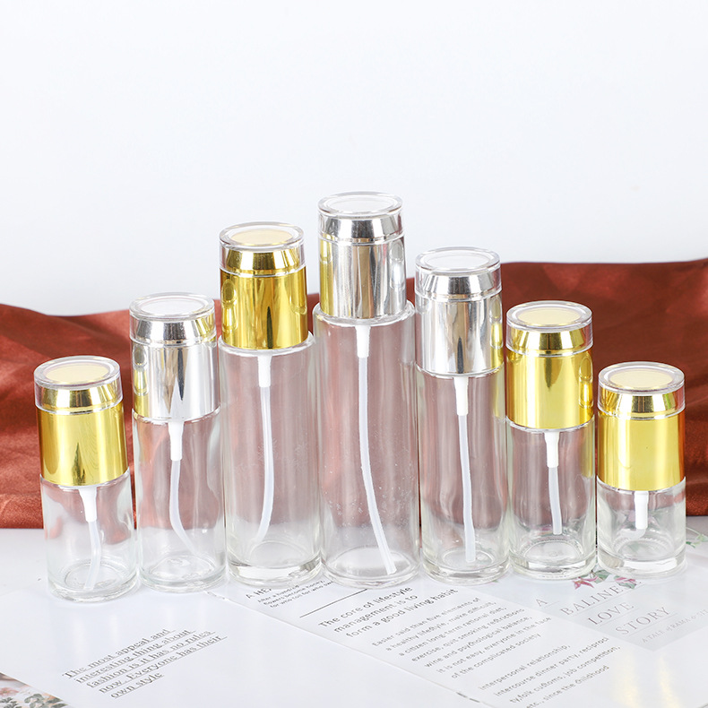 Venta al por mayor botella de aerosol transparente botella de loción cosmética portátil viaje sub-embalaje botella vacía botella de vidrio esencia en stock
