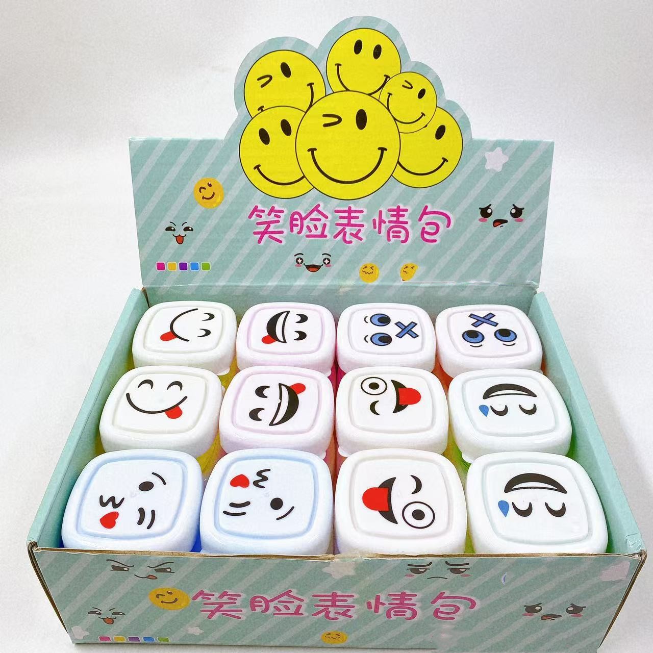 Nuevo 24 en la cara sonriente emoji bolsa goma espumante slime barro colorido para niños barro de cristal juguetes al por mayor
