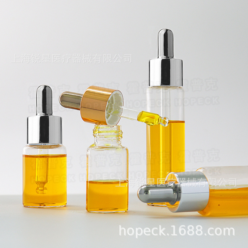 现货直发HOPECK电镀TPU胶帽透明管制玻璃瓶滴管盖精华分装精油瓶