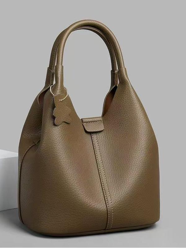 Bolso de cubo de mano casual de color sólido de comercio exterior 2025 nuevo bolso de hombro simple de todo fósforo bolso de mensajero de cuero suave de alta calidad