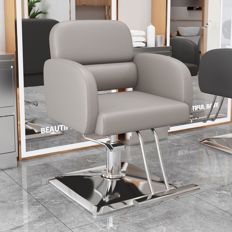 La nueva silla de peluquería simple e innovadora, la silla de peluquería teñida en permanente se puede levantar y levantar, la silla de peluquería giratoria, la silla de corte para el cabello