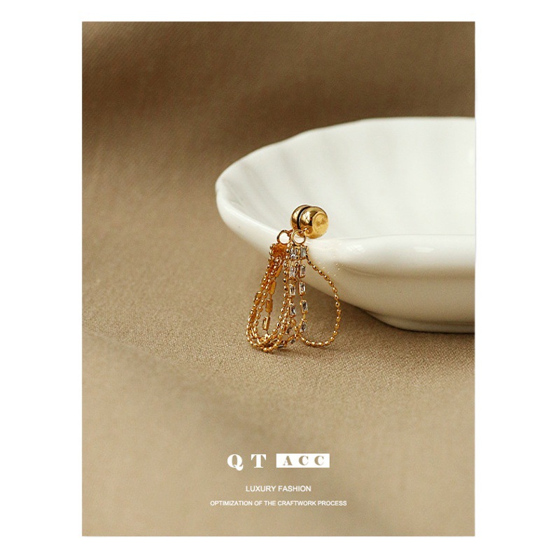 Latón chapado 18K oro real diseño temperamento earless pendientes al por mayor vintage ZIRCON borla oído clip de hueso para las mujeres