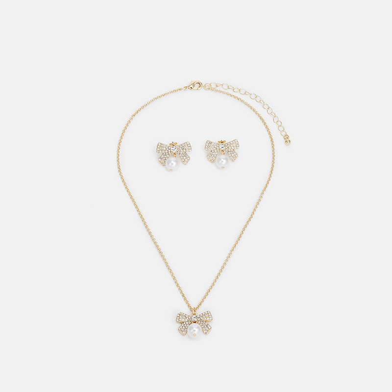 Moda nuevo arco conjunto de joyería de alta calidad collar de diamante de nicho pernos de orejas conjunto de joyería para mujeres