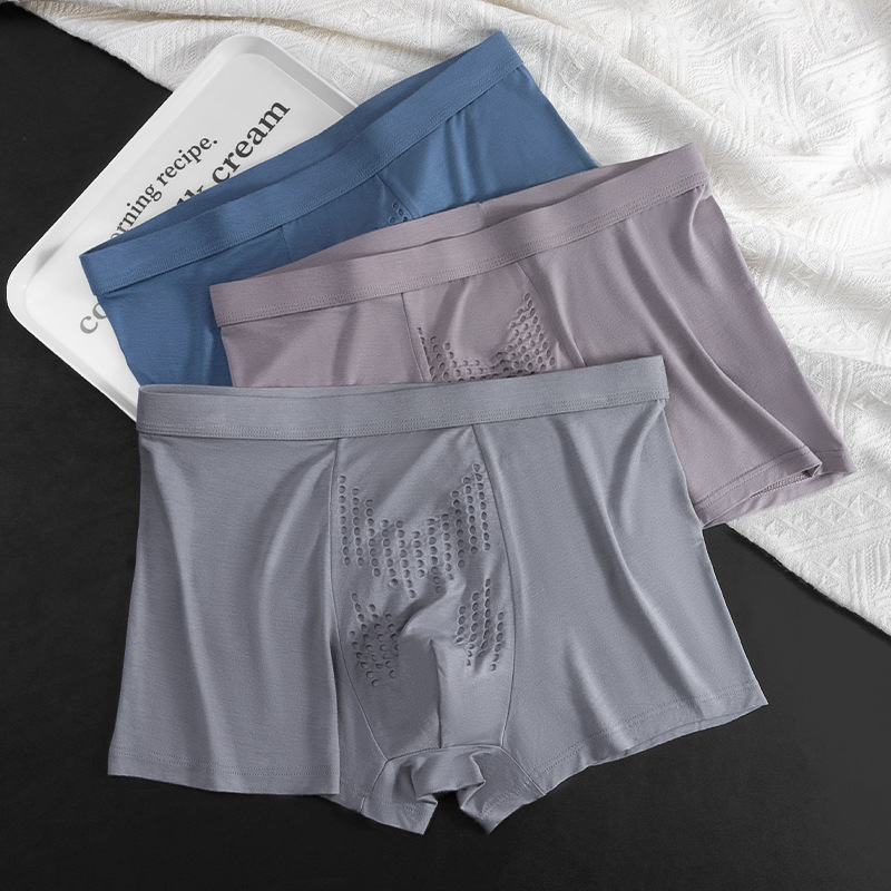 Nuevas calzoncillos de hombre, masaje de gránulos de ostrina, entrepierna antibacteriana, pantalones de cintura mediana para hombres al por mayor