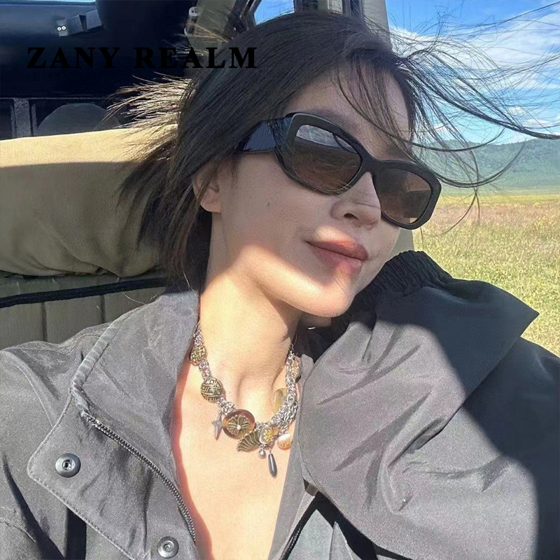 Nuevo Xiaoxiang gato ojo gafas de sol online celebridad estrella cara redonda elegante jalea gris al aire libre gafas de sol verano fabricante en stock