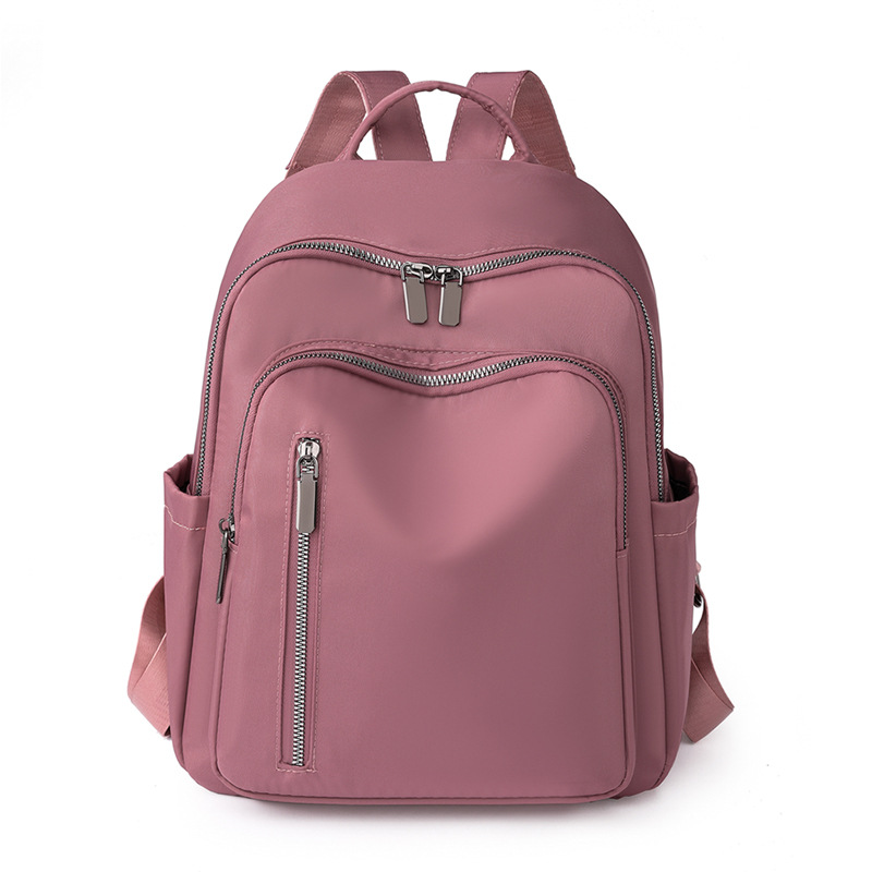 2023 nueva mochila de nailon para mujer coreana, mochila de viaje de gran capacidad para viajeros urbanos de todo fósforo de moda al por mayor