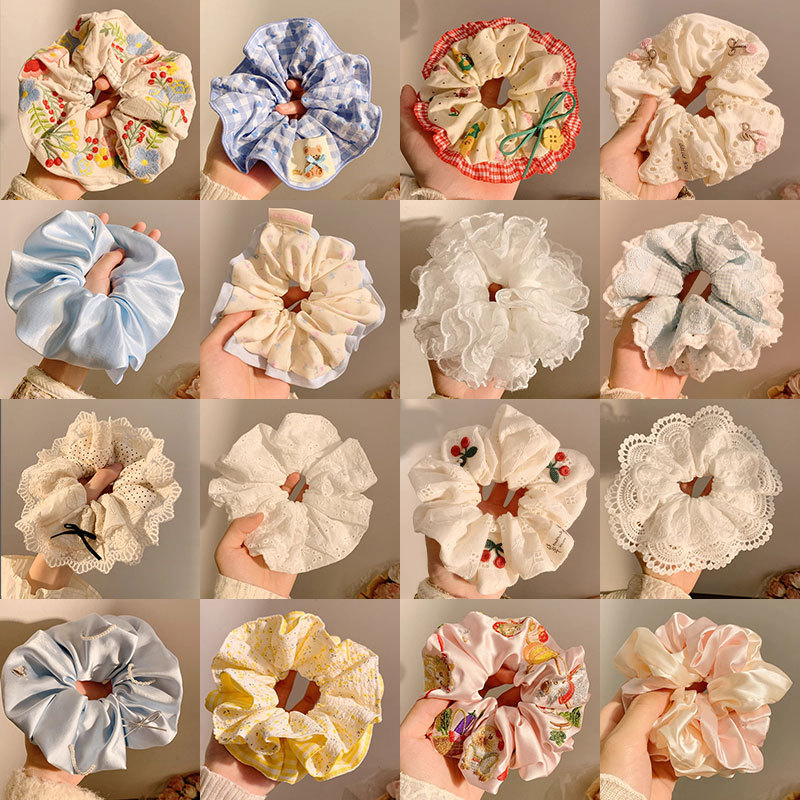 Versión coreana de la linda crema dulce niña cuerda para el cabello lazo del bosque femenino lazo para el cabello del intestino grueso sentido de alta calidad cuerda de cabeza de cola de caballo de gran tamaño