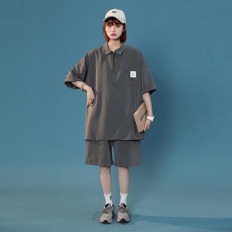 Tendencia juvenil verano solapa manga corta camisa POLO hombres estilo universitario japonés suelto casual pareja camisa de camiseta