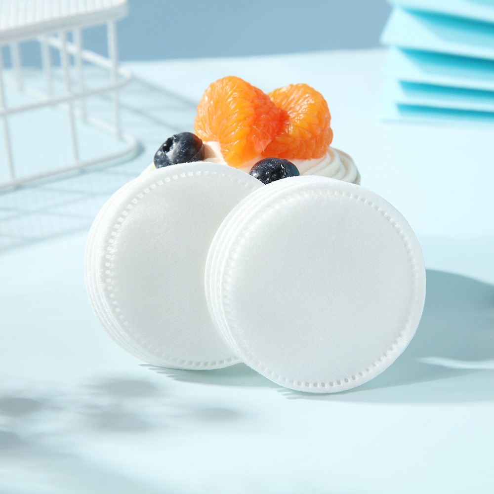 Agujero de aguja transfronterizo bordes de prensa de algodón de maquillaje húmedo ropa de viaje redondo de maquillaje de doble efecto limpiador de algodón desechable al por mayor