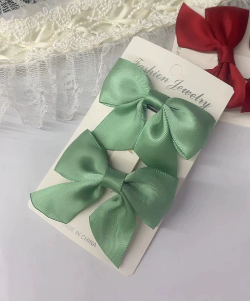 One pair of polyester Wakakusa green (with card but no packaging)