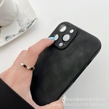 适用苹果14promax一体镜头羊巴皮iPhone13四角气囊防摔皮质手机壳