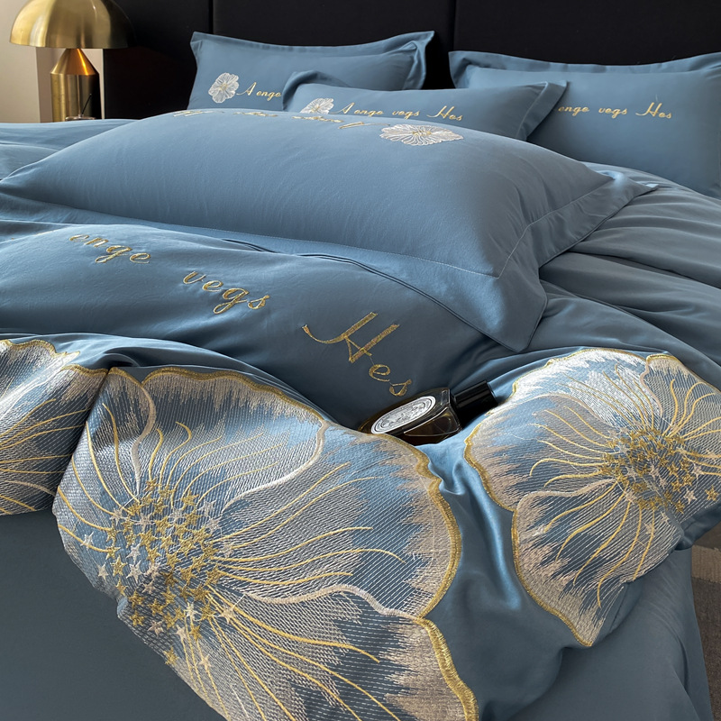 Nuevo traje de cuatro piezas con bordado de seda lavado, sábana de viento de lujo ligero, color sólido, sábana simple, funda de edredón al por mayor
