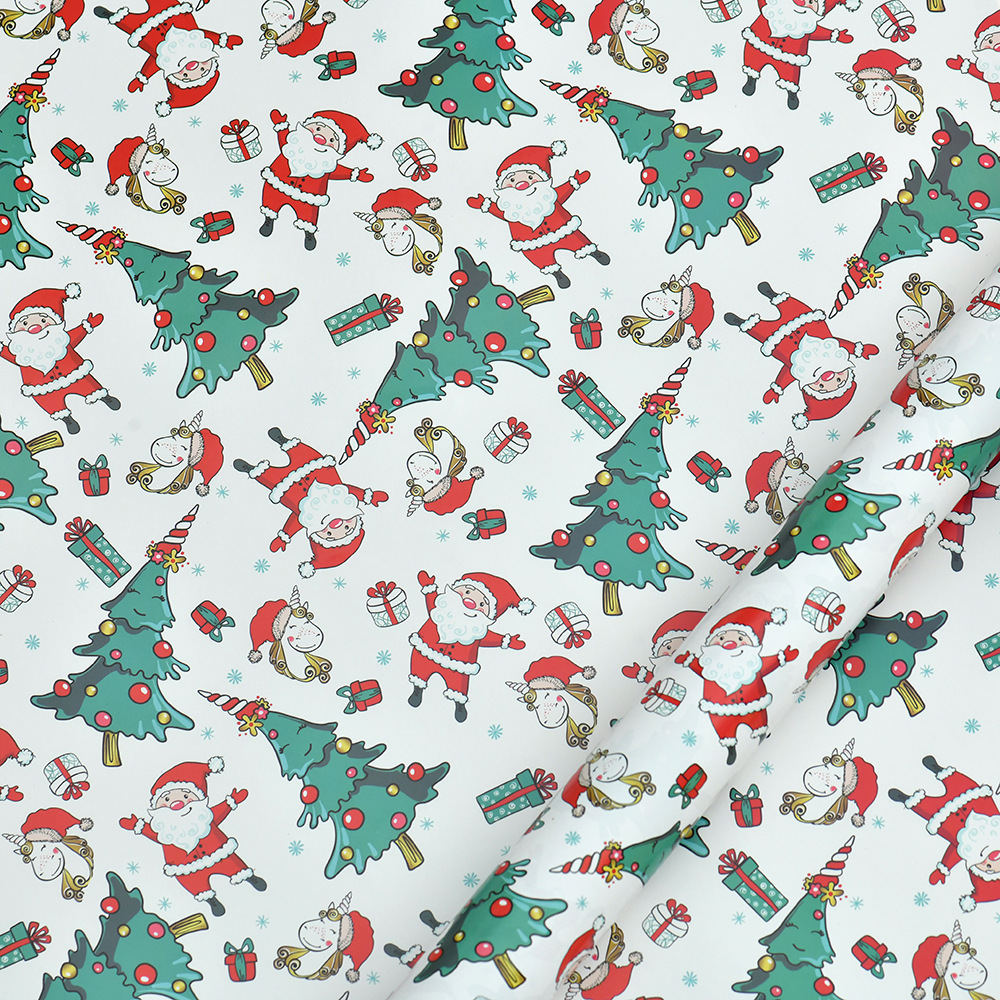 Nuevo papel recubierto brillante papel de regalo de navidad papel de regalo muñeco de nieve de dibujos animados árbol de navidad papel de regalo