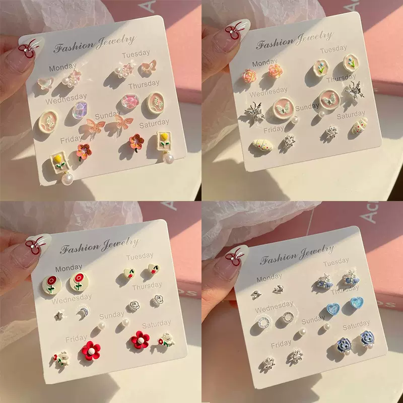 甜美可爱桃粉色超仙蝴蝶一周耳钉套装女银针小众花季少女花朵耳饰
