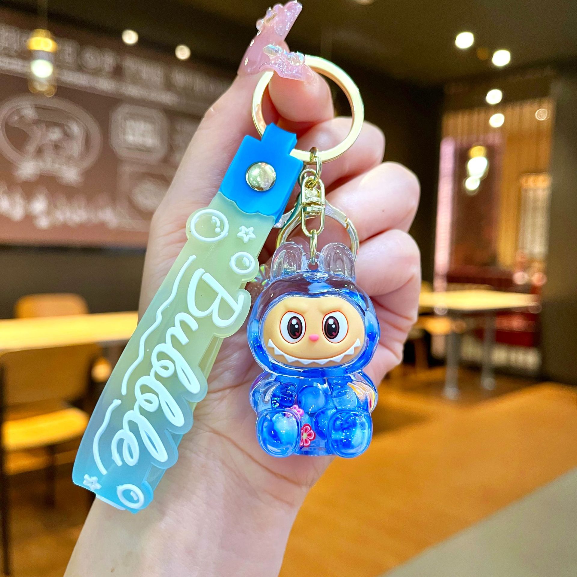 Llavero red acrílico con arena flotante