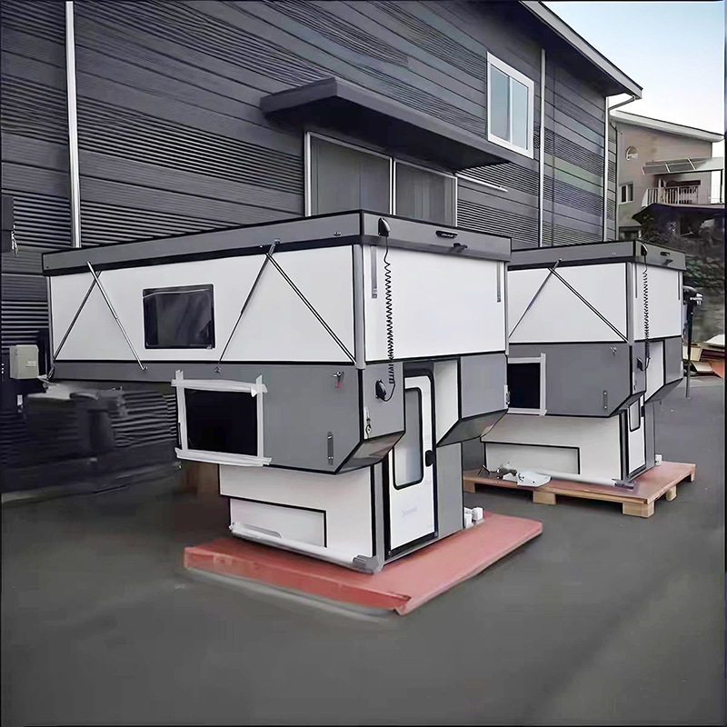 La camioneta de camada blanca se puede elevar y bajar la caja de la casa de carga, la camioneta se puede desmontar y montar de manera flexible y conveniente.