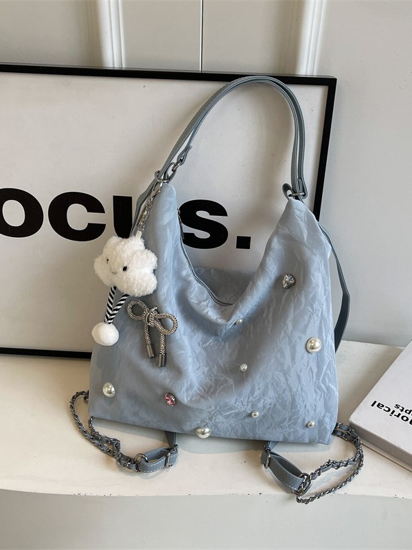 Bolsa de gran capacidad para mujeres 2024 nuevo nicho de alto nivel de diseño de diamantes de viaje multifuncional mochila de doble hombro inclinada