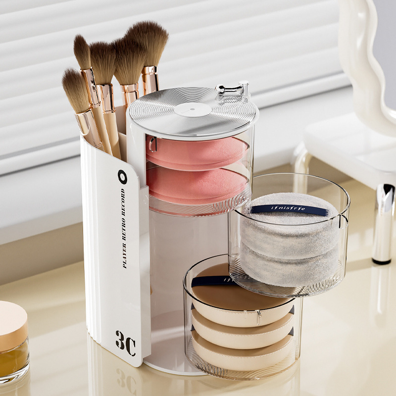 La Caja de almacenamiento de polvo gira a prueba de polvo, la Mesa de belleza, los huevos, el colchón de aire, la cómoda, el cepillo de maquillaje de lápiz labial de varias capas y el estante de objetos.