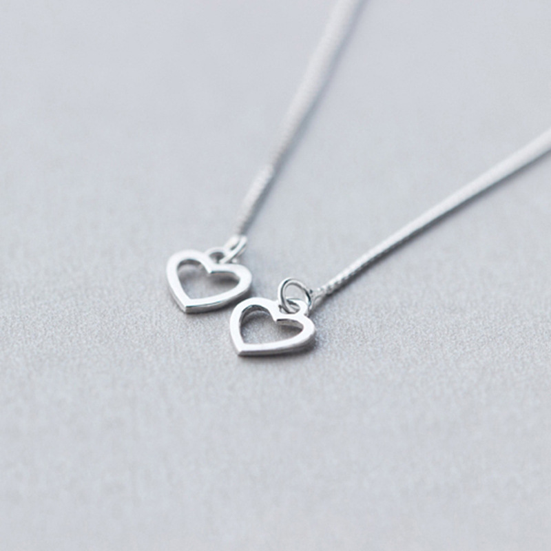 S925 orejas de plata femeninas coreanas orejas de amor hueco dulce corazón largo pendientes de orejas joyas de orejas E1121