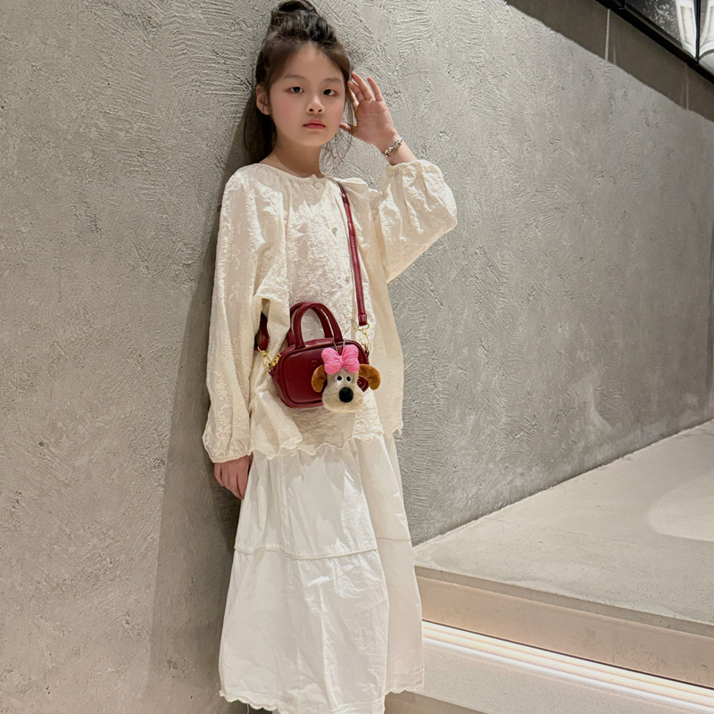 Bolso de hombro de niña popular de estilo coreano Mini cachorro colgante bolso de bebé 2025 nuevo bolso para niños