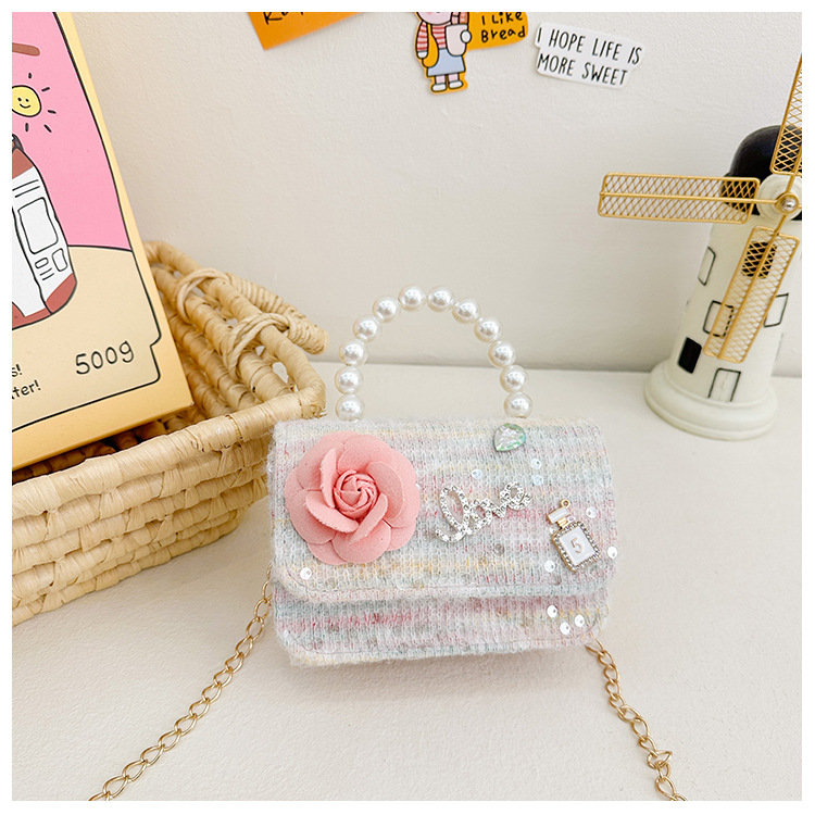 Primavera y verano nuevos bolsos infantiles, bolsos de perlas de arco, bolsos de mano, princesa de estilo extranjero, bolsos de cambio de hombro