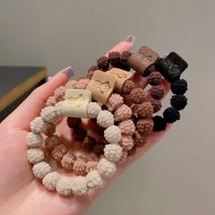 ファッションのウサギは髪の毛のゴムの女性の新型の高弾力の線のひもの髪の飾りの高い馬尾のひもの卸売りを結びます。