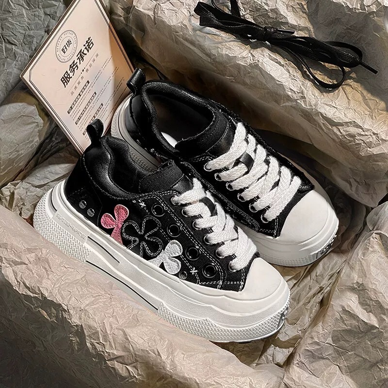 High-End Trendy 20S Canvas Shoes with Distressed Edges in Amber Yellow, Featuring a Plum Blossom Design and Thick-Soled Height Increase High-End Trendy 20S Canvas Shoes with Distressed Edges in Amber Yellow, Featuring a Plum Blossom Design and Thick-Soled Height Increase