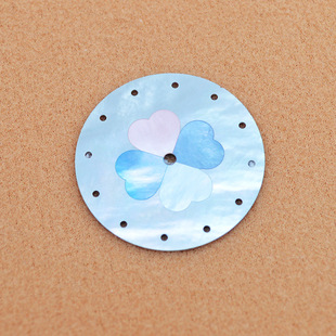 The Four-Leaf Clover Shape Is Assembled Using Mother-Of-Pearl Pieces with Distinct Pink Stripes and Is Literally Made in the Factory