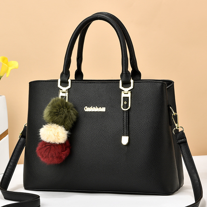 A4 bolsa grande de papel para las mujeres de mediana edad Otoño e Invierno Nuevo bolso de cuero suave simple madre mediana bolsa de hombro del todo fósforo