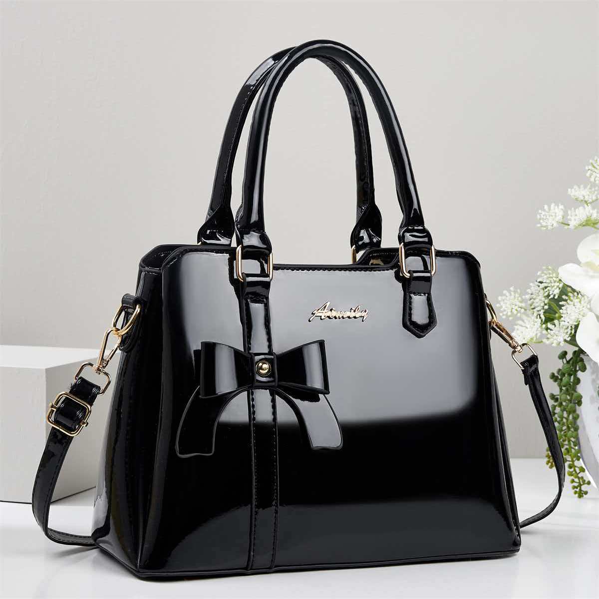 Bolso de mano de arco de piel brillante, bolso de hombro casual de moda, bolso de madre, temperamento, bolso de mochila transfronterizo