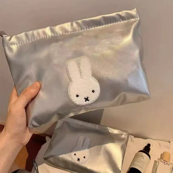 Bolsos de maquillaje de dibujos animados simpáticos de alto valor de la cara, bolsas de almacenamiento de gran capacidad de mujeres, bolsas de almacenamiento de artículos portátiles