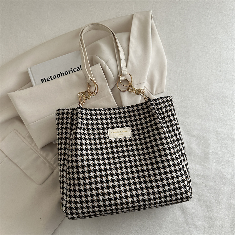 Bolsas retrógradas coreanas de mujeres 2024 otoño nuevo paquete de brazo de viaje de gran capacidad bolsas de hombro