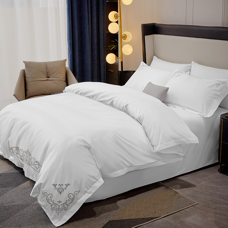 Hoteles residenciales bordados blancos cuatro piezas de sábanas de lujo ligeras europeas sábanas tres o cuatro piezas de sábanas al por mayor
