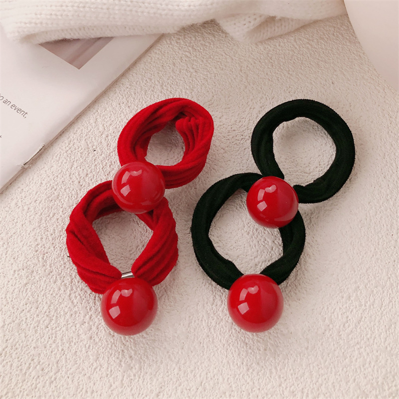 Temperamento coreano simple bola roja anillo de cabello de cabello chica cola de caballo tiras gruesas tiras elásticas cubierta tira elástica al por mayor