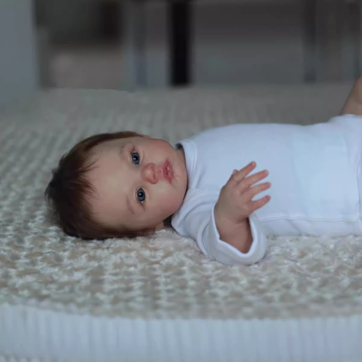 Muñeca suave de nacimiento familiar muñeca pesada de simulación de niños CM regalo de cumpleaños transfronterizo 45 bebés de venta caliente