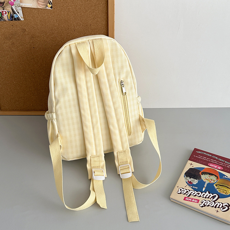 Mochila nueva mochila de todo fósforo, estudiante de secundaria japonesa, estudiante de secundaria, bolso de estudiante de viaje, versión coreana, mochila de color sólido simple al por mayor