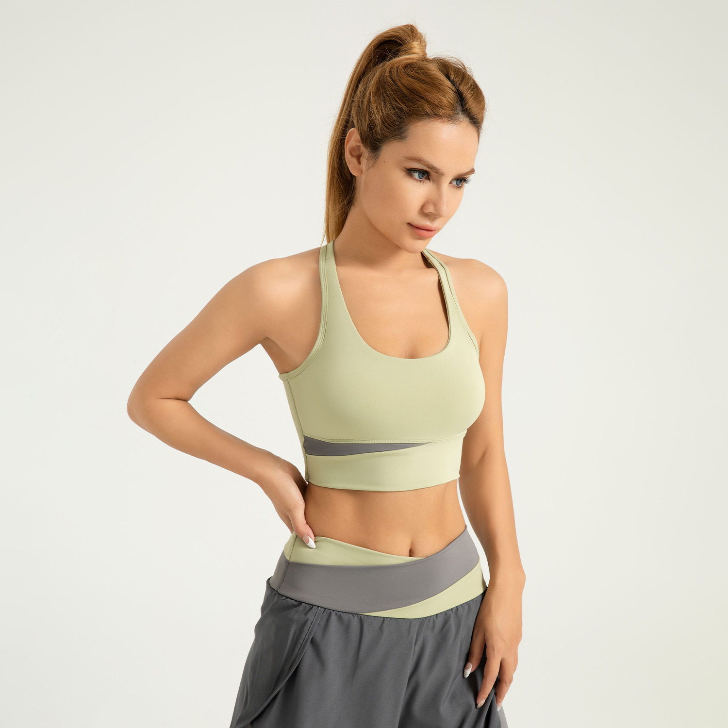 Área transfronteriza de Juyitang Ropa interior deportiva empalmada Chaleco de fitness a prueba de golpes de alta resistencia para mujer