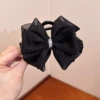 With bow, black