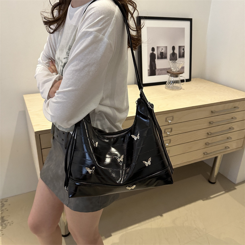 Butterfly decoración de viaje mochila 2024 nueva anguila nicho mochila de hombro de gran capacidad de viaje mochila multiuso