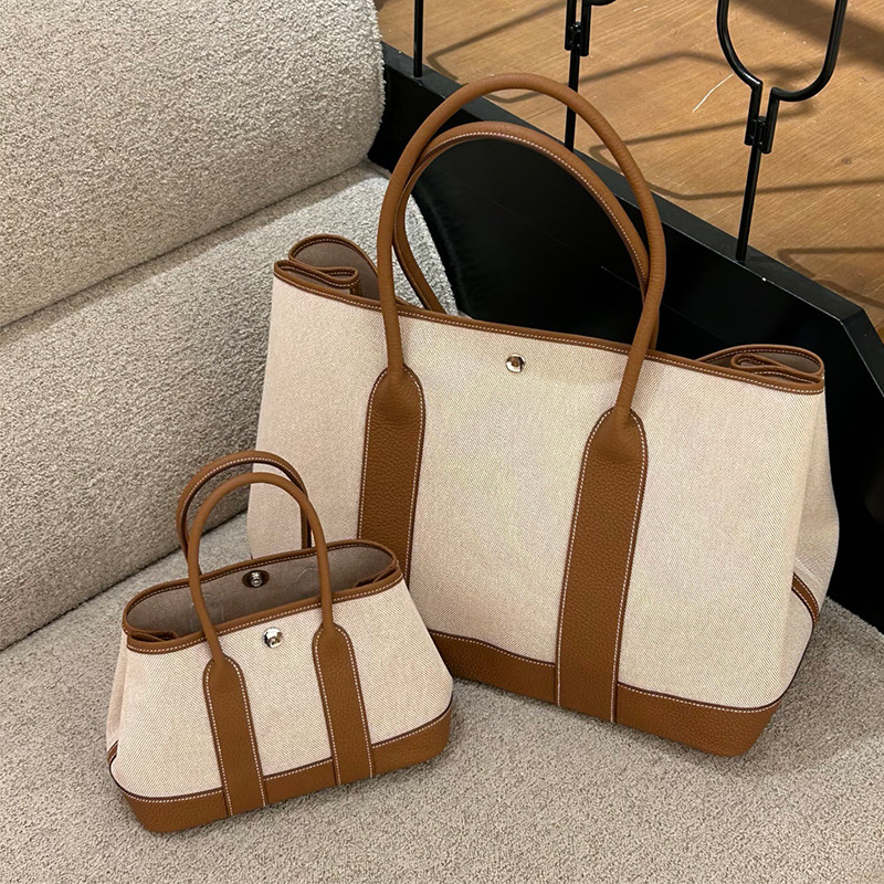 2026 Spring and Summer New Style Canvas Leather Garden Bag Single Shoulder Crossbody Handbag Large Capacity Tote Bag Commuter Women's Bag