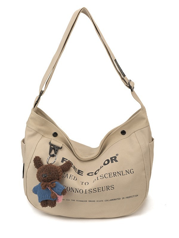 Bolsa de lona para mujeres 2026 nueva bolsa de gran capacidad transfronteriza impresa letras de viaje casual mochila de hombro