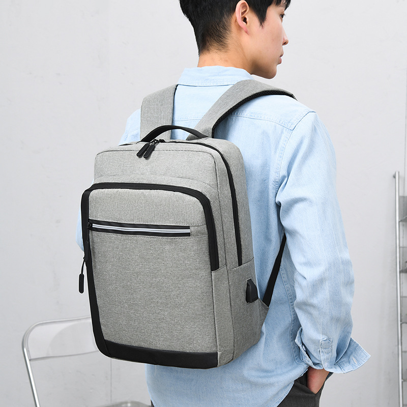 Nuevo contraste de color personalizado multi-funcional mochila USB bolsa de ordenador de negocios de carga hombres y mujeres simple mochila casual
