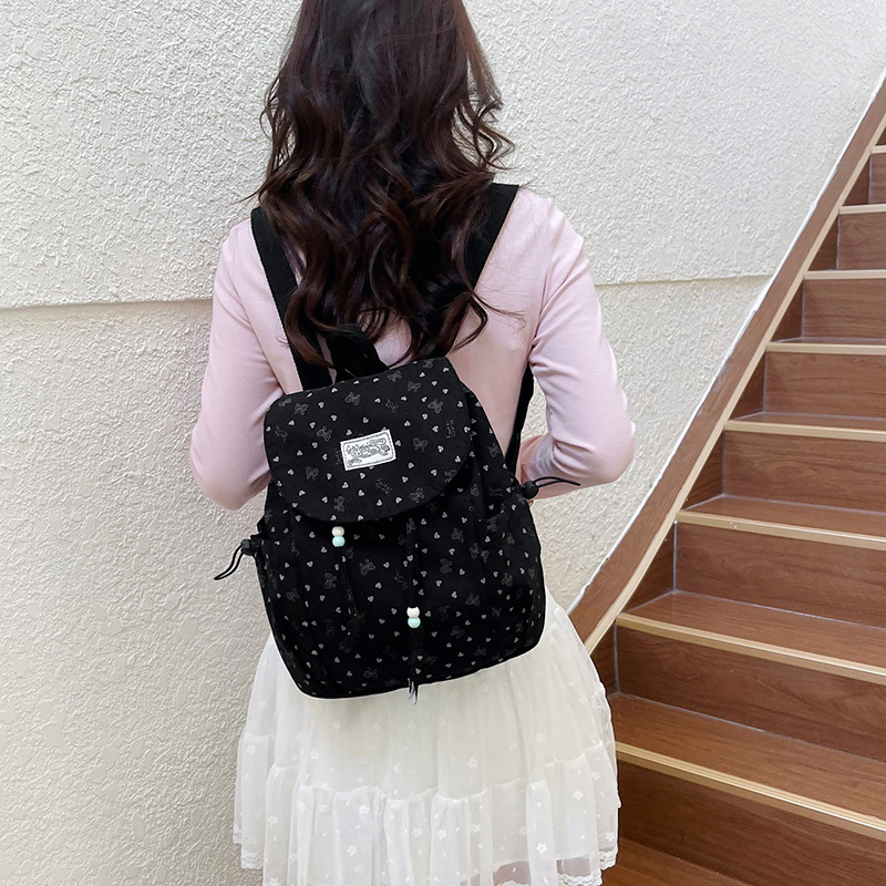 2026 mochila de viajes escolares de gran capacidad para mujeres coreanas frescas pequeñas ondas de diseño de moda mochila de moda mochila de moda