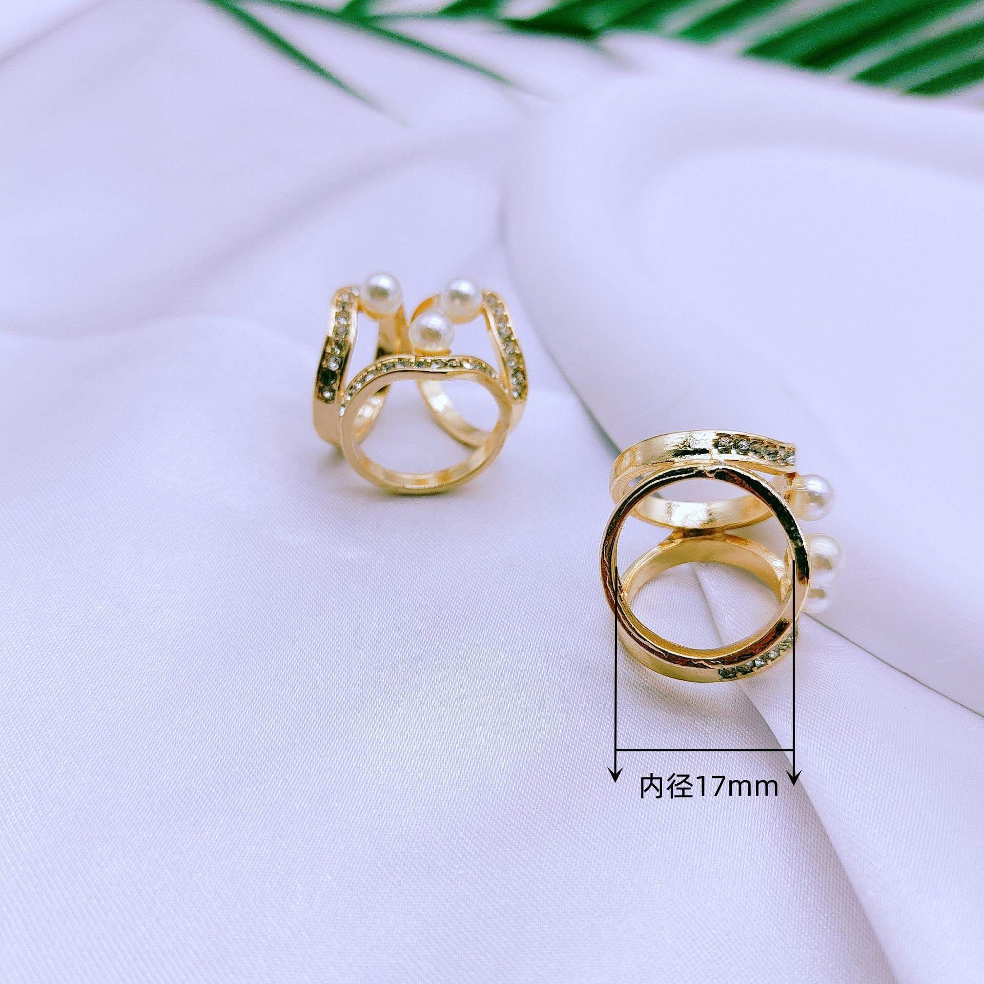 Corea del Sur multi-funcional bufanda hebilla de alta calidad perla moda nueva Camelia windbreaker cinturón hebilla de alta gama joyería al por mayor