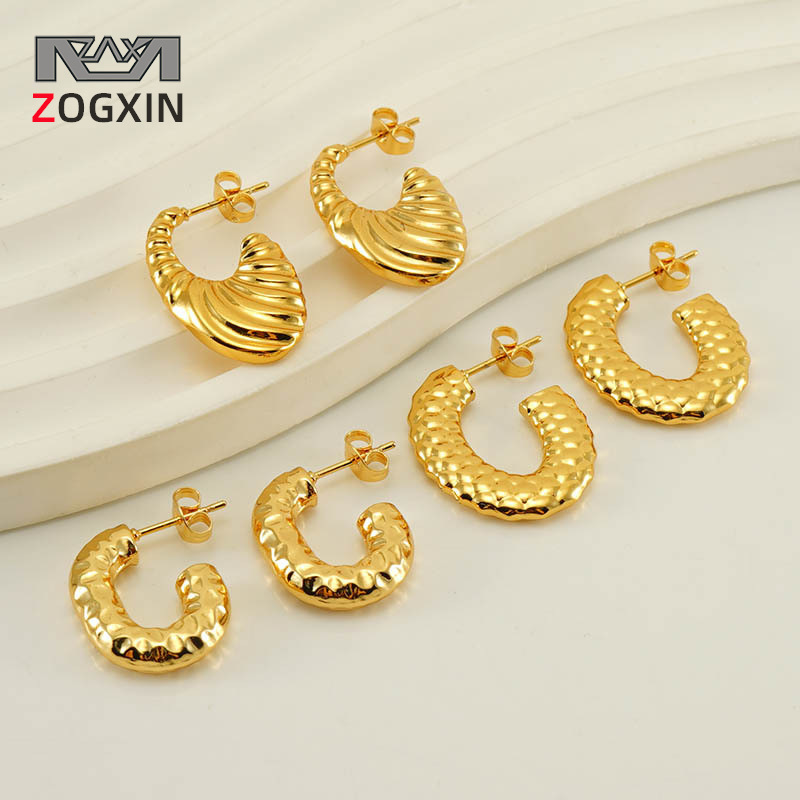 Pendientes de moda europeos y americanos transfronterizos de alto grado de acero inoxidable de oro 18K elegantes pendientes de acero de titanio para mujeres en forma de U
