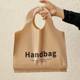 Clothing store handbag women's packing bag round mouth shopping gift bag thickened plastic portable clothing bag wholesale