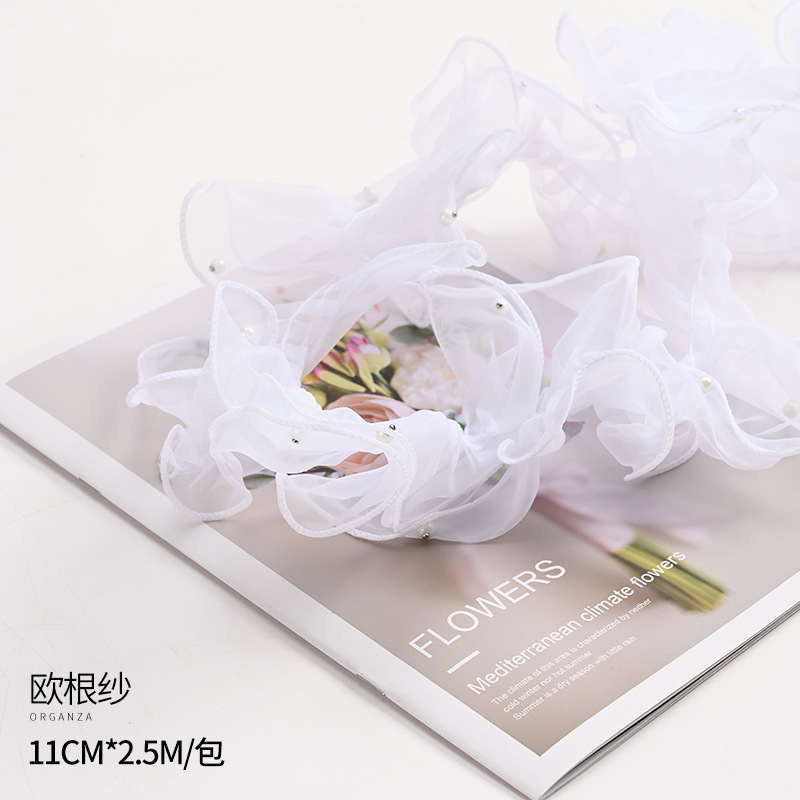 Material de embalaje de flores al por mayor Día de San Valentín Floral Regalo Ramo de papel envuelto en flores Pliegues de perlas hilo ondulado hilo ondulado